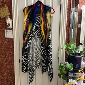 Beautiful Women's Casual Sleeveless Draped Open Front cover up.